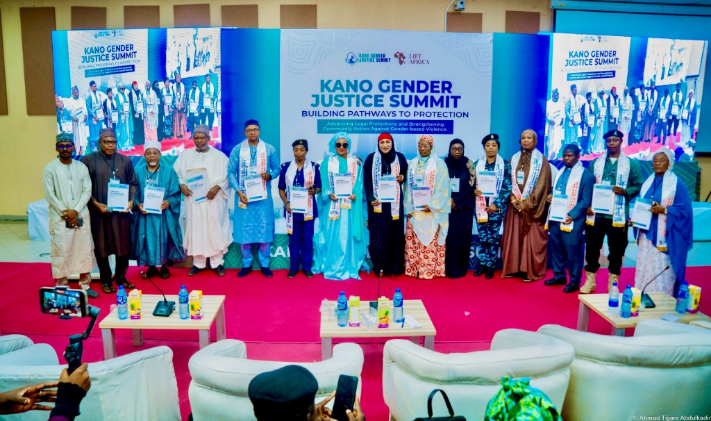 Aisha Hamman and key traditional, religious, and security leaders holding the Gender Justice Declaration